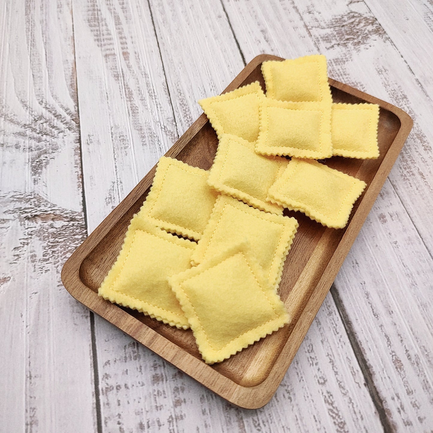 Ravioli pasta beige farfalle, bow tie play food