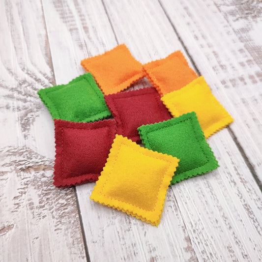 Ravioli pasta colored farfalle, bow tie play food