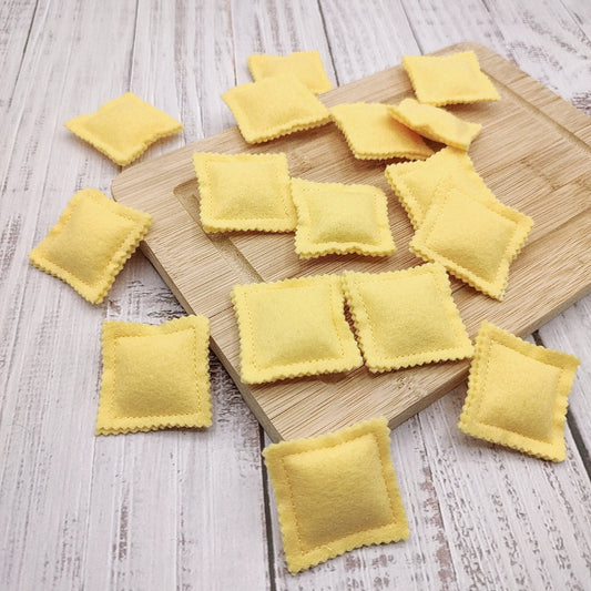 Ravioli pasta beige farfalle, bow tie play food