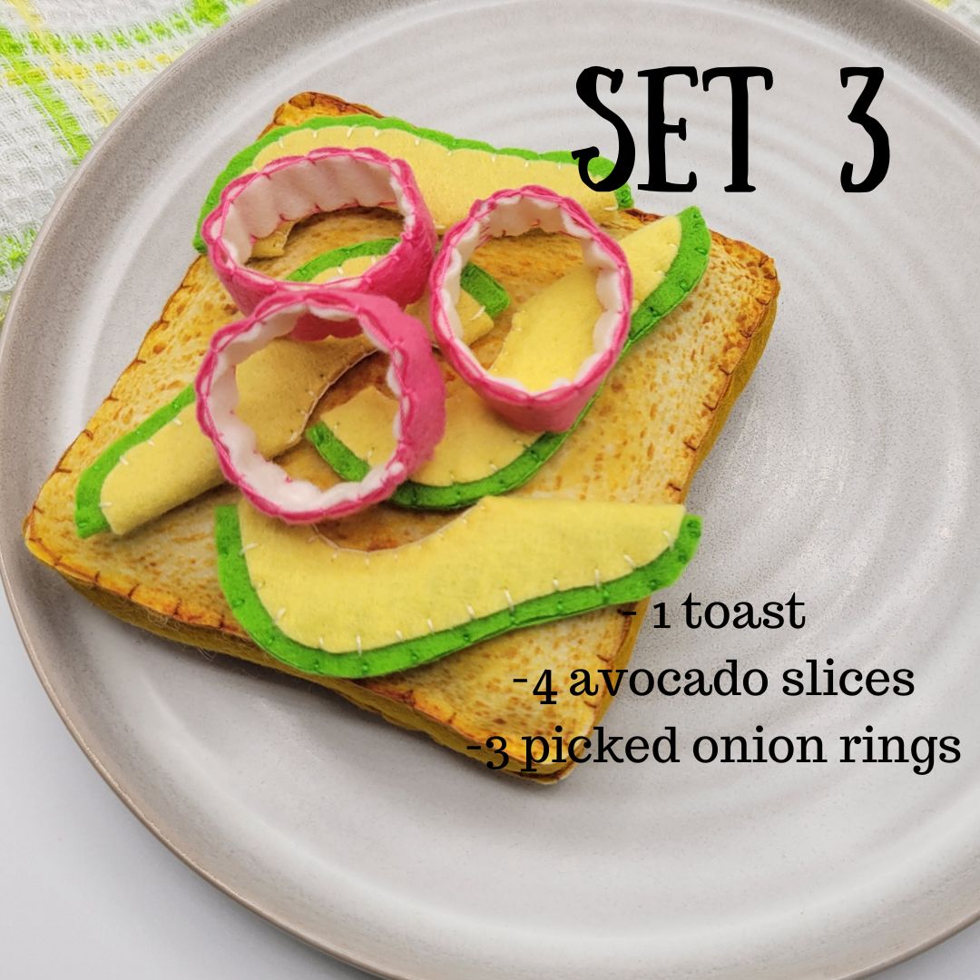 Avocado toast plush food toy with pickled onion rings on a white plate, labeled 'Set 3'.