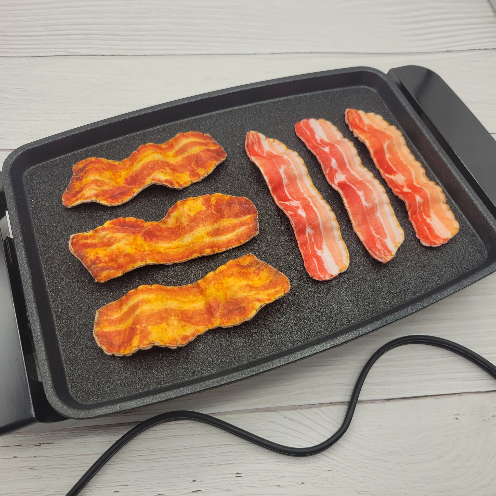 Close-up felt bacon plush pretend food toy