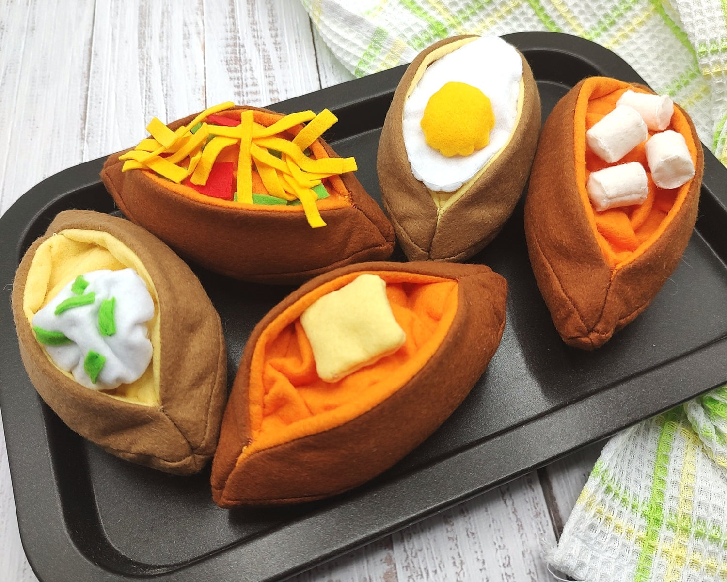 Baked sweet potato plush toy on white background