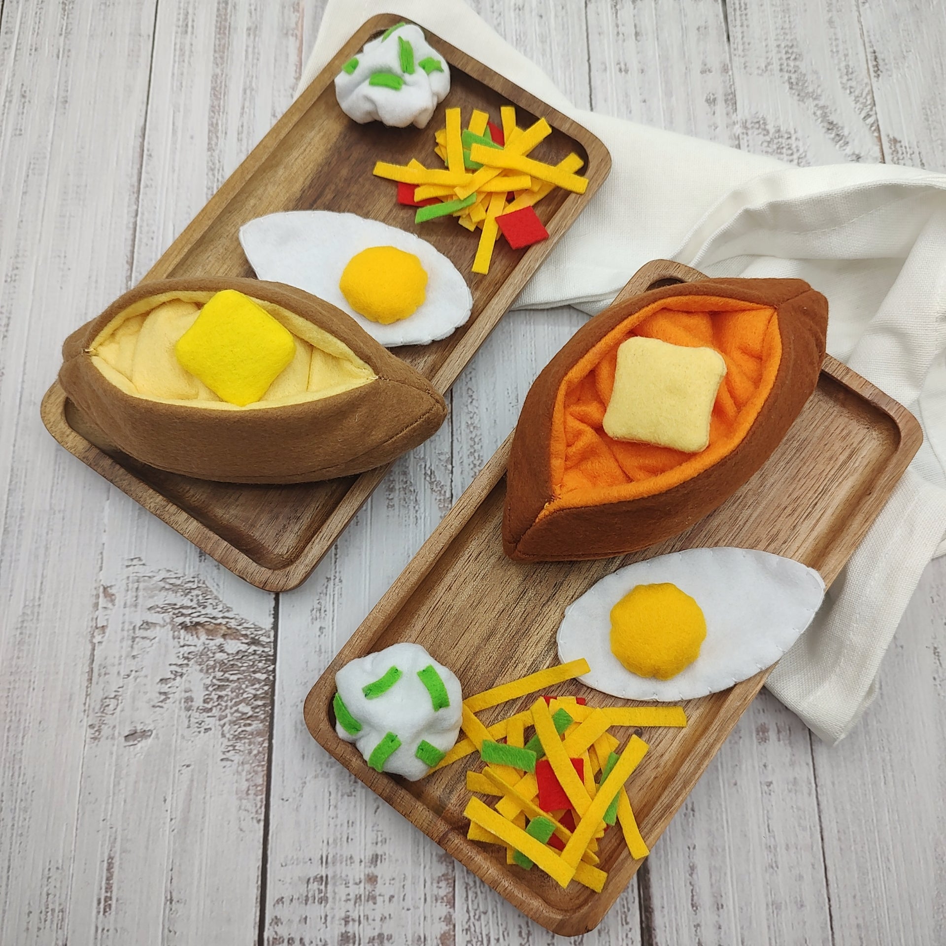 Plush sweet potato served on toy plate for pretend play