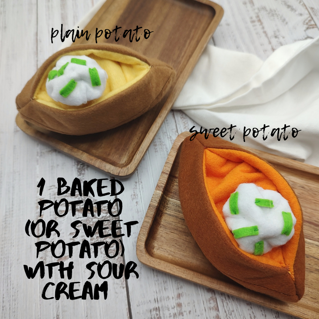 Soft sweet potato plush toy stacked with other food