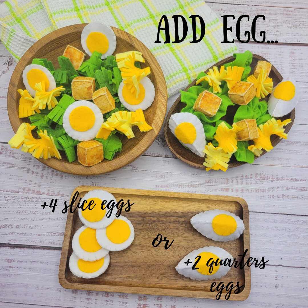 Two wooden plates with food items plush toy and text instructions on how to add eggs.