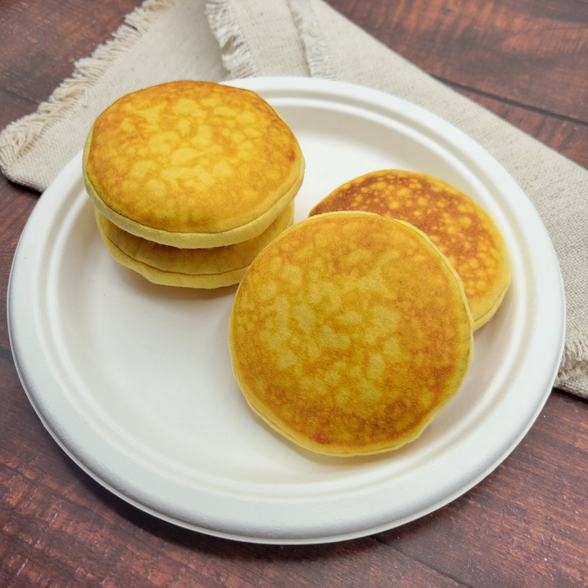Stack of pancake plush toys for pretend kitchen play