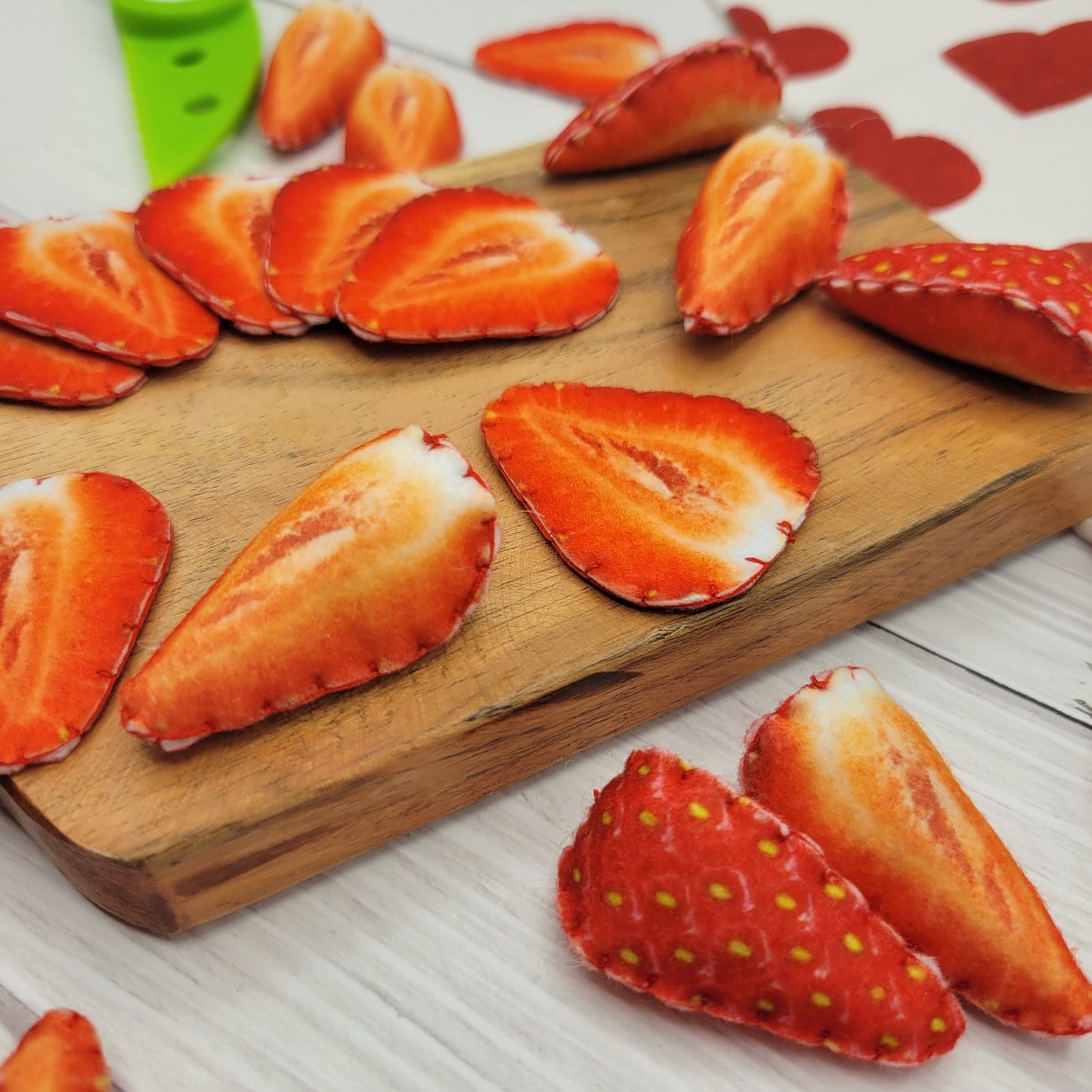 Close-up strawberry slice plush pretend food felt toy