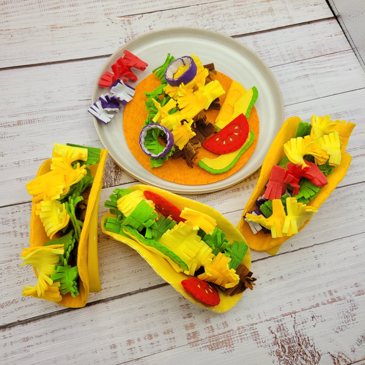 Plush taco served on toy plate