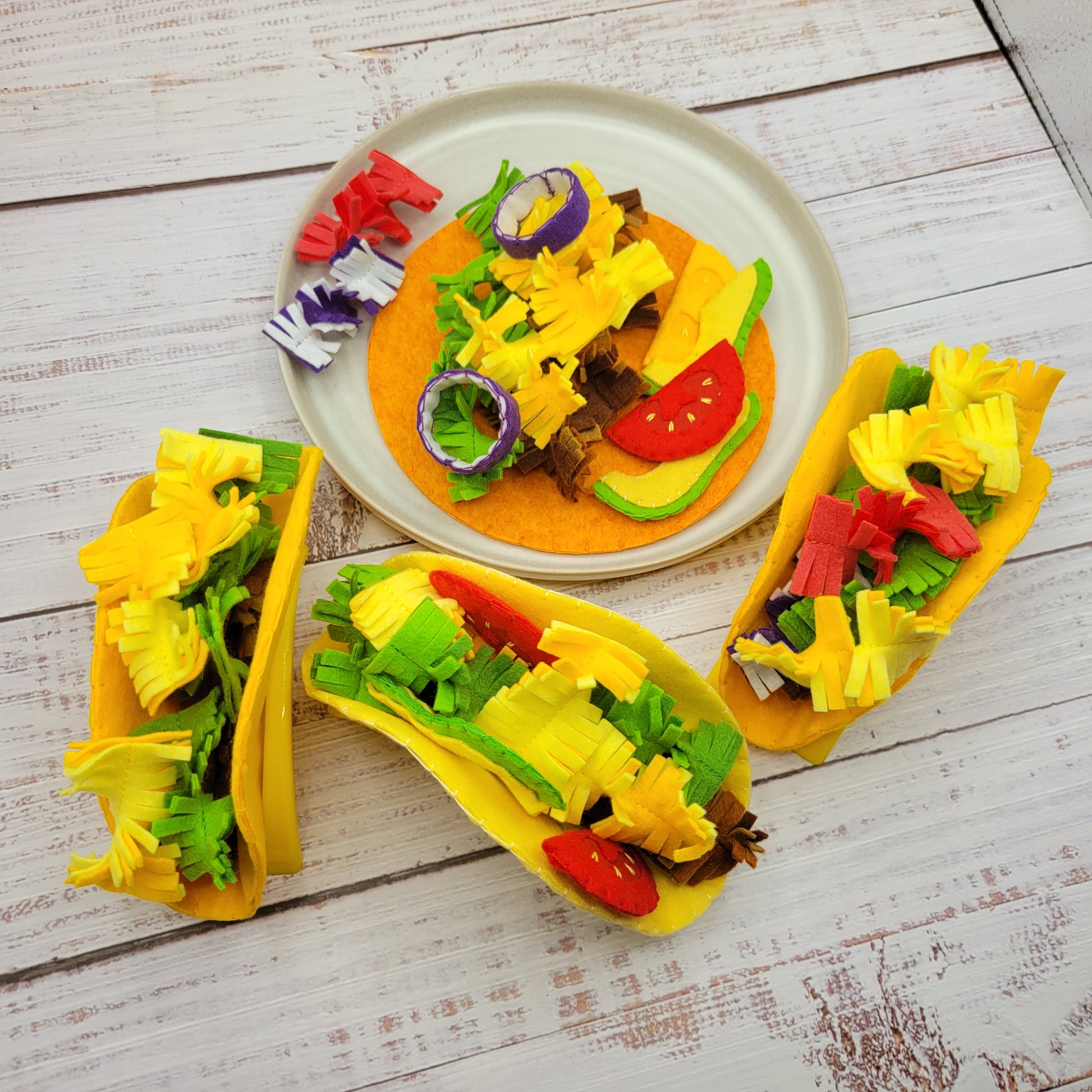 Plush taco served on toy plate