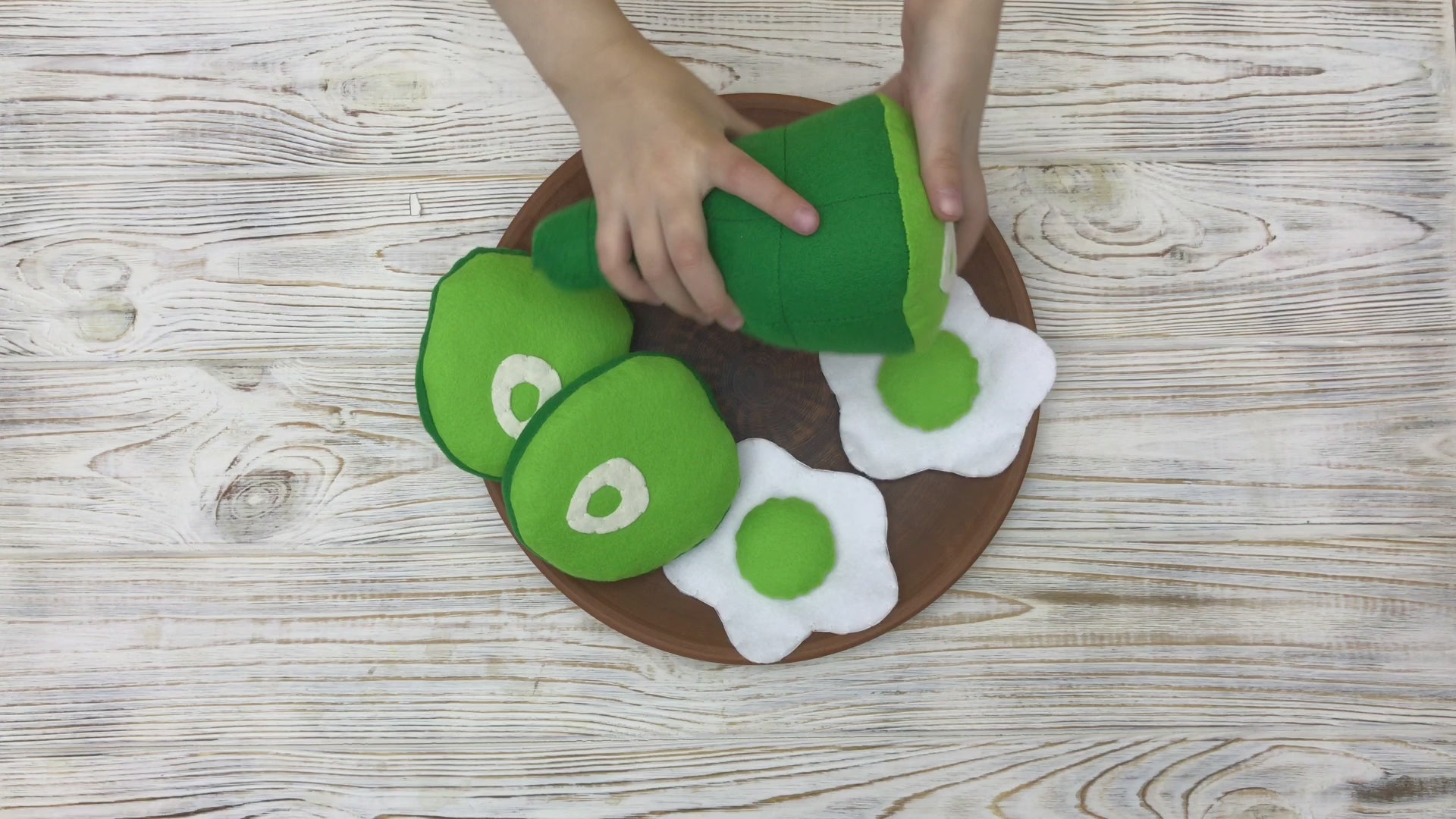 Plush green eggs and ham in toy breakfast scene