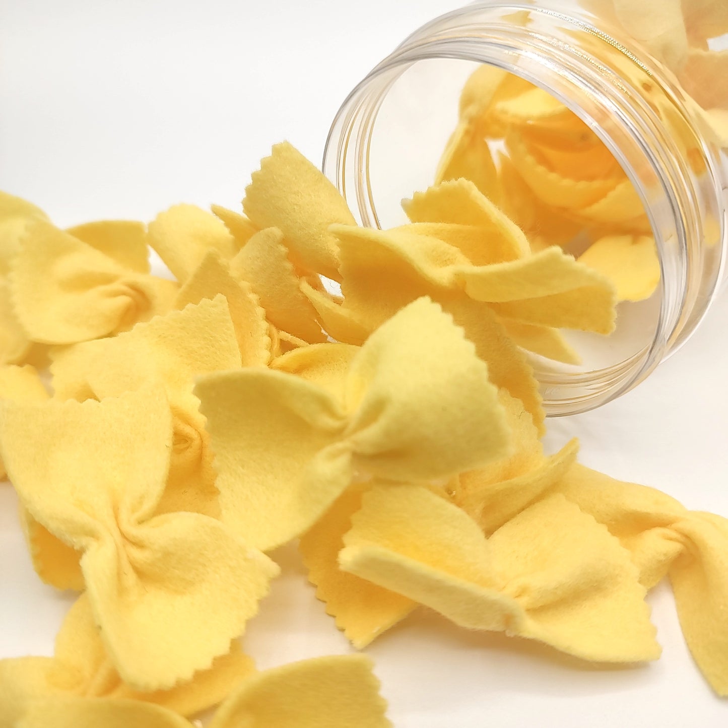 Pasta beige farfalle, bow tie play food