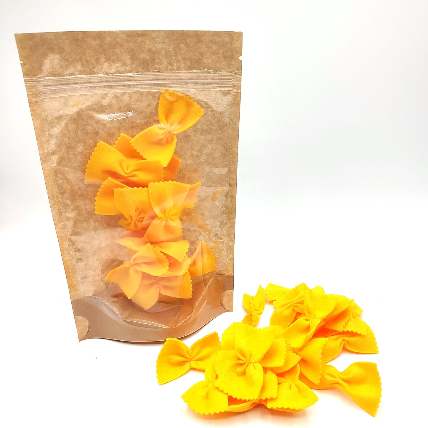 Pasta yellow farfalle, bow tie play food