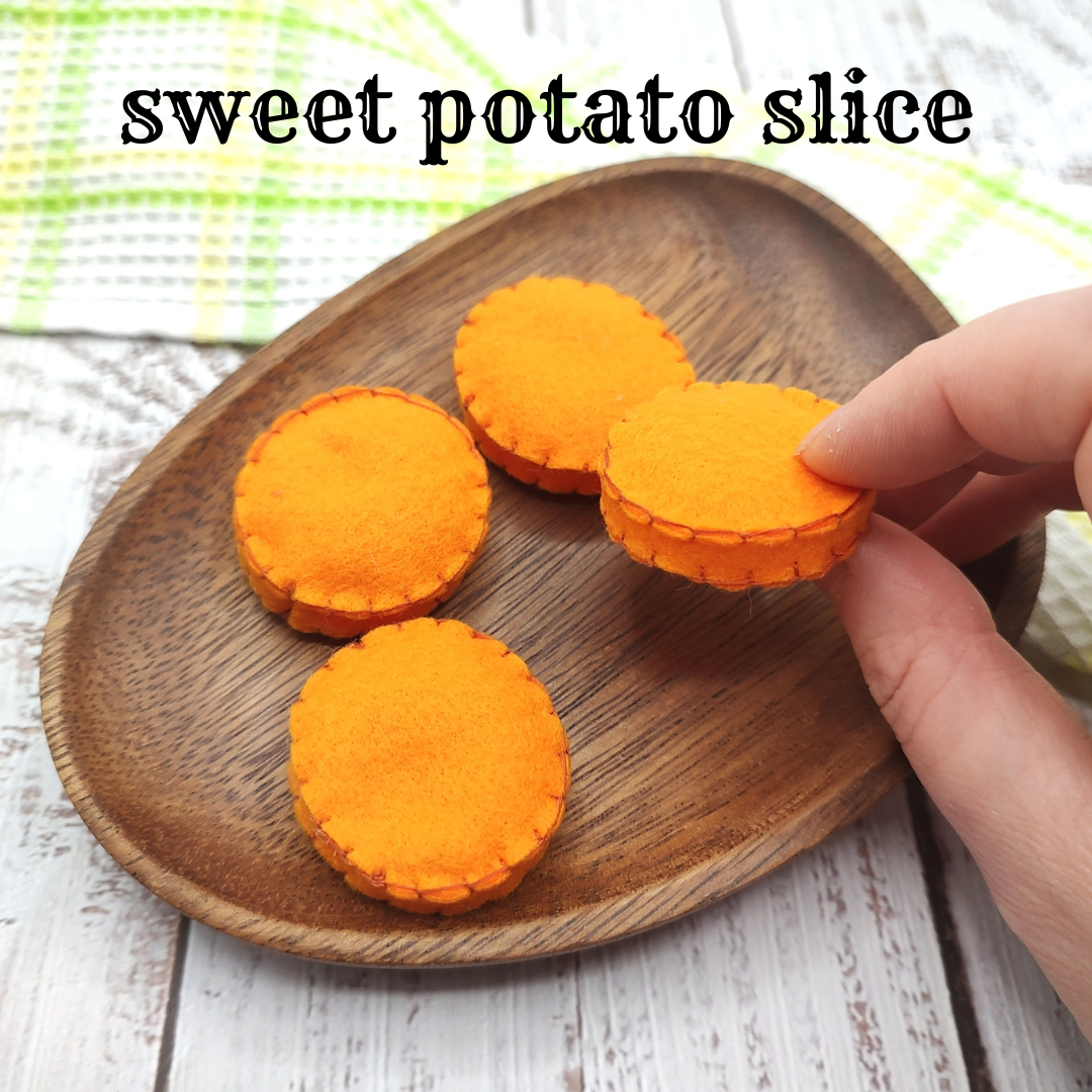 Baked slice potatoes "handmade", roasted sweet potato play food