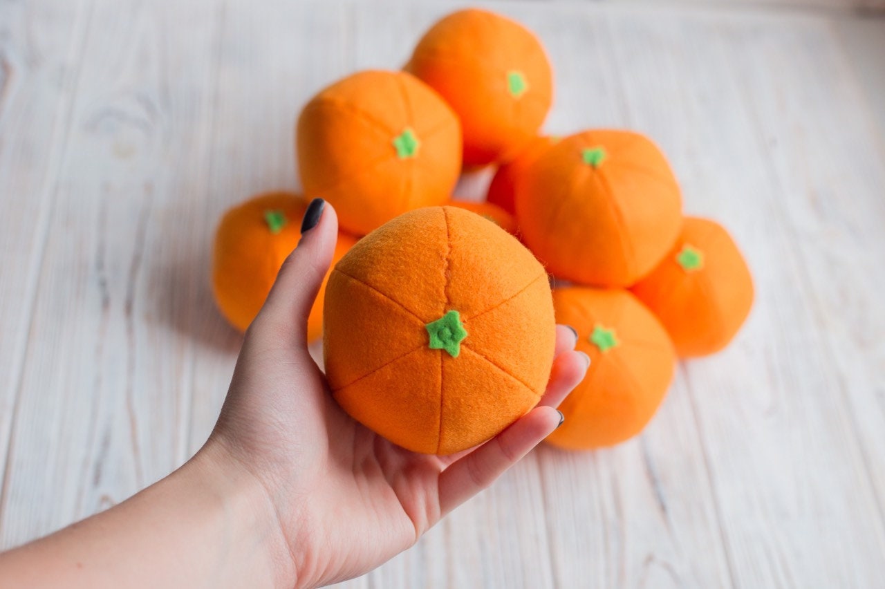 Orange felt fruit